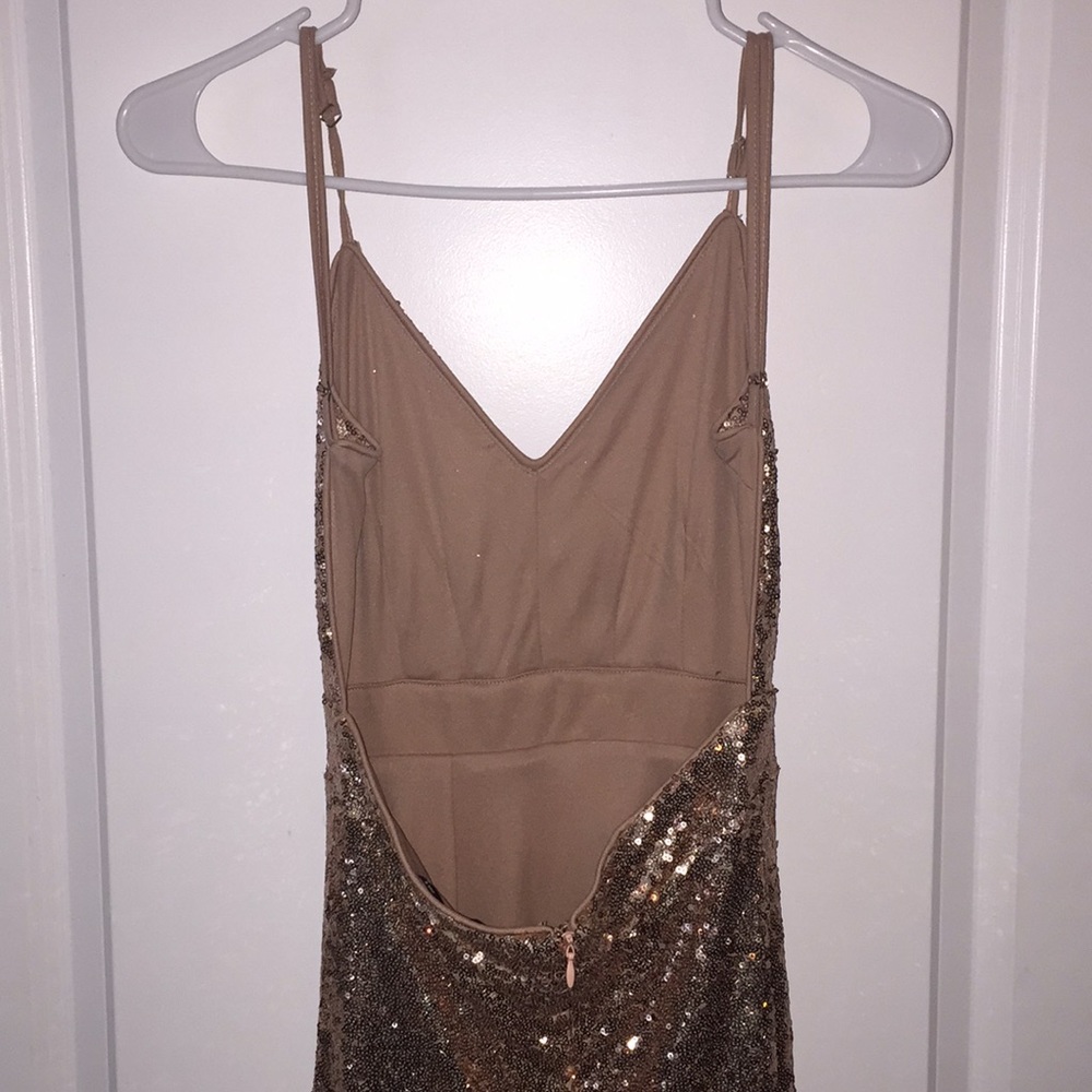 Beautiful long open back sequin prom gown